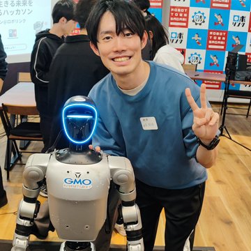 With a humanoid robot at a hackathon