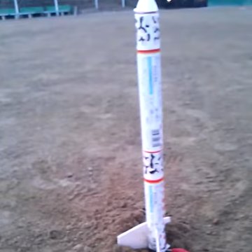 A model rocket on its launch pad